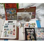 Two stamp albums and a stock book of world stamps together with other stamps