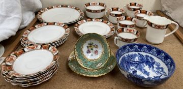 A 19th century hand painted tea cup and saucer together with a part tea set and blue and white bowl