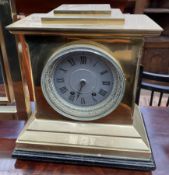 A 19th century brass mantle clock,