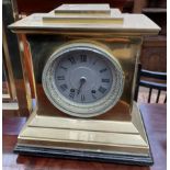 A 19th century brass mantle clock,