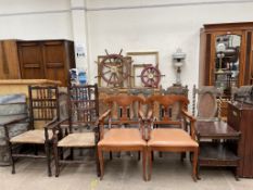 A pair of spindle back elbow chairs together with a pair of continental elbow chairs and a