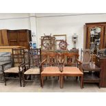 A pair of spindle back elbow chairs together with a pair of continental elbow chairs and a