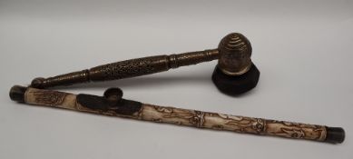 A Chinese brass opium pipe, with pierced and cast decoration,