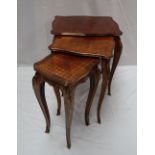 A nest of three French Louis XV style kingwood, parquetry and gilt metal mounted occasional tables,
