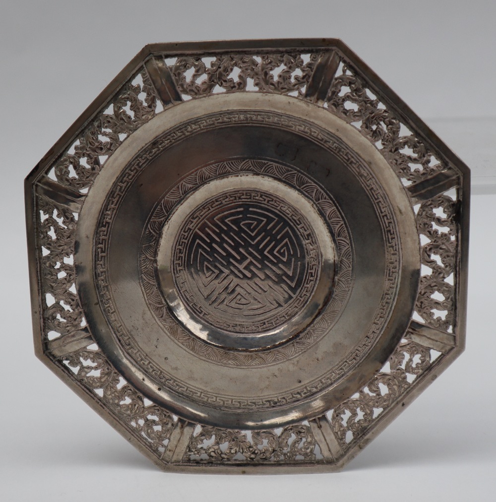 A Chinese white metal dish of octagonal form, the rim pierced with flowers, - Image 2 of 10