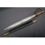 A short sword, with a brass fish scale grip and eagle pommel,