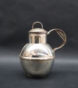 A modern silver lidded canister, of bulbous form with loop handle, 13cm high,