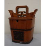 A Chinese rice bucket of octagonal tapering form, with a pierced handle,