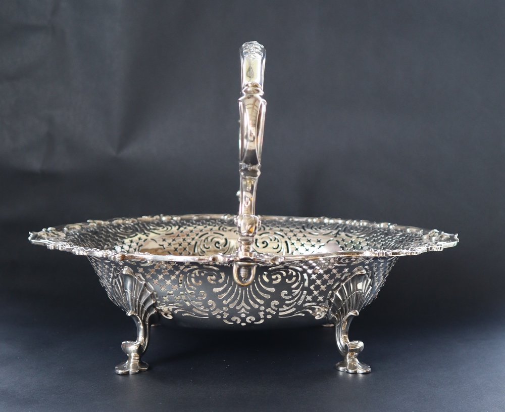 A George II silver cake basket, of pointed oval form, the border pierced with scrolls and leaves, - Image 2 of 8