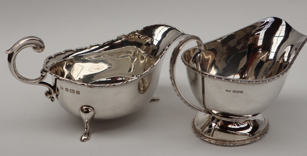 A George V silver sauce boat with a beaded rim on a spreading foot, Sheffield, 1912,