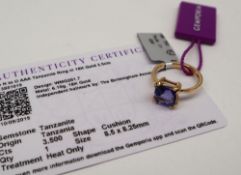 Gemporia - An 18ct gold tanzanite ring, set with a 3.