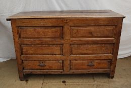 An 18th century oak coffer,