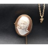 A 9ct gold shell cameo brooch depicting a head and shoulders portrait of a lady,