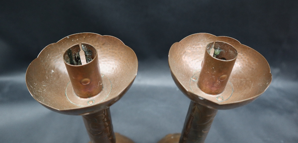 A pair of Newlyn copper candlesticks, with a flared top, - Image 3 of 4