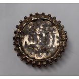 A silver brooch of circular form, pierced "Bessie",