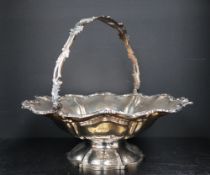 A Victorian silver swing handled cake basket, 33cm diameter, approximately 950 grams,