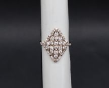 Gemporia - An 18ct gold diamond cluster ring,