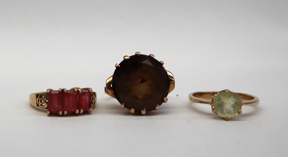 A 9ct gold smoky quartz set dress ring, size L 1/2 together with three other gem set 9ct gold rings, - Image 5 of 5