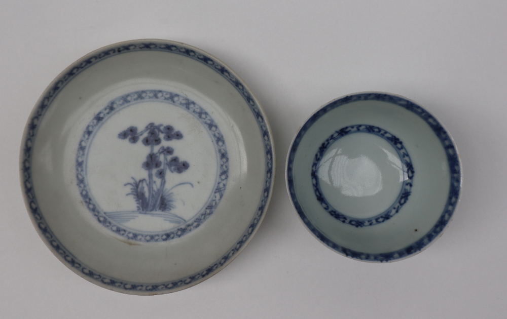 A Chinese Nanking Cargo blue and white porcelain tea bowl and saucer decorated with a tree and - Image 2 of 6