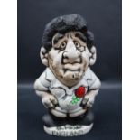 A John Hughes pottery Grogg of a Rugby player in England kit with no 8 to the reverse,