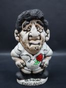 A John Hughes pottery Grogg of a Rugby player in England kit with no 8 to the reverse,