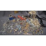 A large quantity of costume jewellery including necklaces, rings, brooches, bangles,