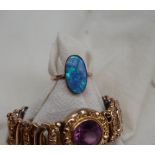 A 9ct gold opal ring, set with an oval opal panel, size N, approximately 2.