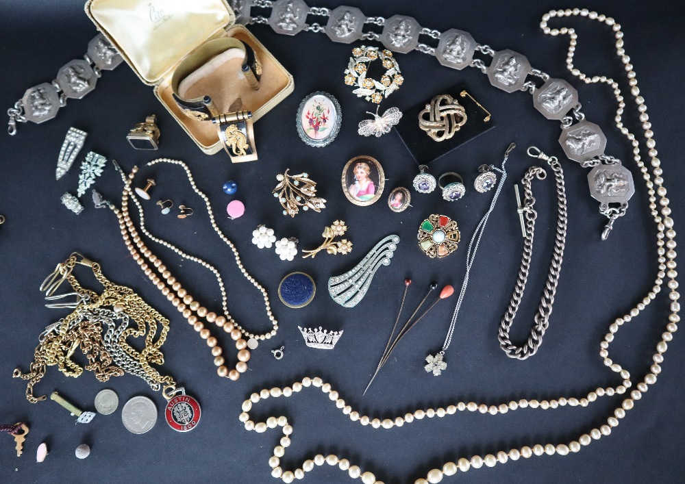 A silver Albert watch chain together with assorted costume jewellery including brooches,