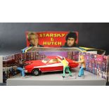 A 1977 Corgi Starsaky & Hutch Ford Torino, with three figures,