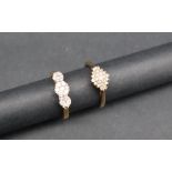 A 9ct gold diamond set cluster ring, size Q 1/2 together with another diamond cluster ring,