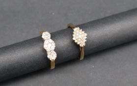 A 9ct gold diamond set cluster ring, size Q 1/2 together with another diamond cluster ring,