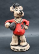 A John Hughes pottery Grogg of a Bear Rugby player in Welsh kit, No.