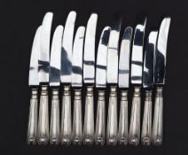 A set of six Elizabeth II silver handled shell and thread pattern table knives,