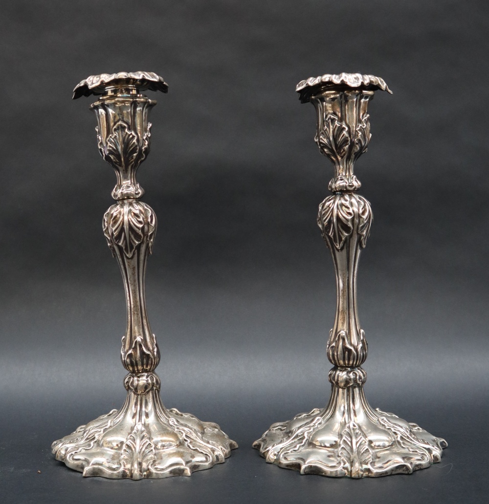 A pair of Edward VII silver candlesticks,