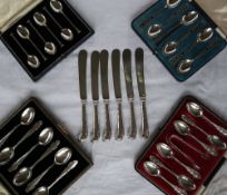 A set of six George V silver seal ended coffee spoons, Sheffield,