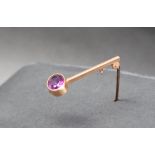 A 9ct yellow gold amethyst set bar brooch, approximately 2.