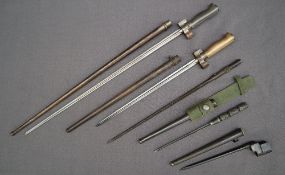 A needle bayonet with a steel grip and cruciform blade, in a steel scabbard,
