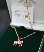 A 9ct Welsh gold Clogau horse pendant, on a 9ct gold necklace, approximately 5.