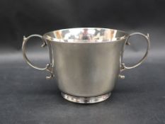 A George IV silver twin handled bowl on a pedestal foot, London, 1934, Josiah Williams & Co,