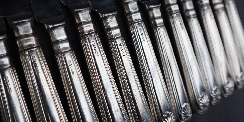 A set of six Elizabeth II silver handled shell and thread pattern table knives, - Image 2 of 2