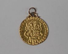 A George III gold shield back Guinea dated 1766, with a fixed pendant mount, approximately 8.