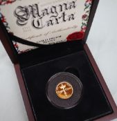 A 2015 800th Anniversary Magna Carta 9ct gold proof penny, 4 grams,