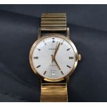 A Gentleman's 9ct gold Garrard automatic wristwatch,