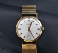 A Gentleman's 9ct gold Garrard automatic wristwatch,