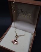 A 9ct Clogau Welsh gold pendant in the form of a mouse on a 9ct gold chain, approximately 4 grams,