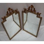 A pair of French gilt gesso wall mirrors,