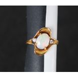 A 14ct yellow gold opal and diamond ring,