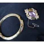 A rock crystal and seed pearl brooch, of pointed oval form,