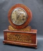 A Victorian rosewood and brass inlaid bracket clock, with a circular brass dial,