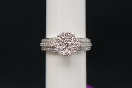 Gemporia - A platinum diamond Tomas Rae cluster ring,